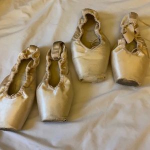 Used pointe shoes for art work